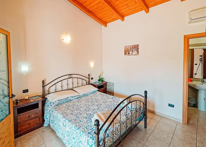 Alloggio per agriturismo Rocce Bianche - Porticato Arbus